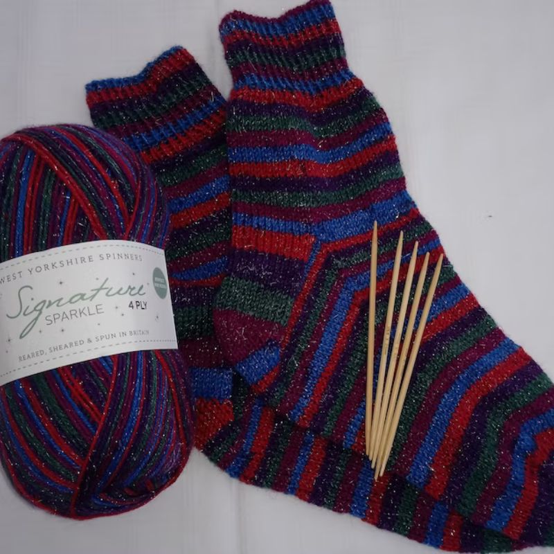 Sock knitting kit with festive colors