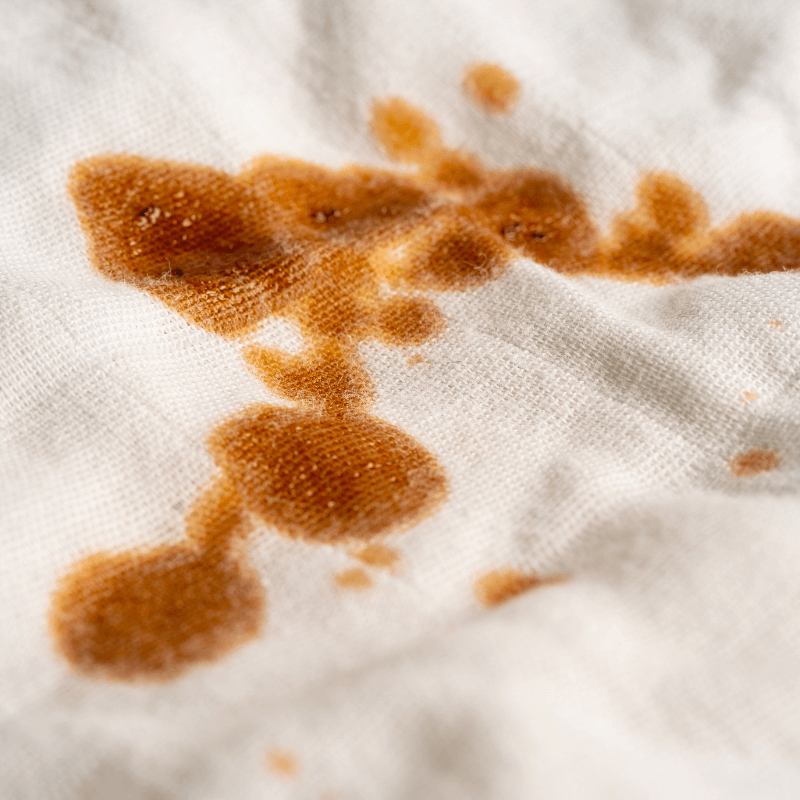 brown stains on white clothes after washing